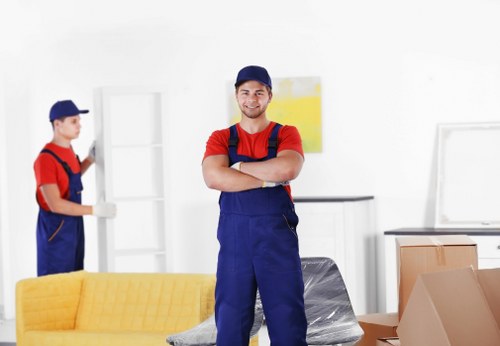 House removal team planning a move in Brompton with boxes and furniture