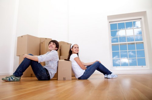 Removal crew handling furniture carefully during a Brompton property move